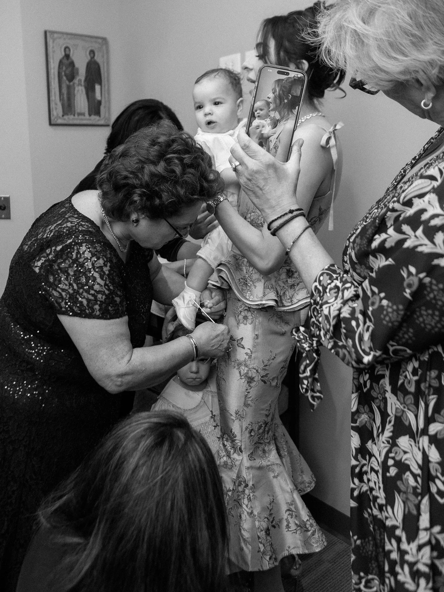 Today is another baptism day and I want to reflect on last weeks. 

The first photo might be my favorite image of the entire year. It feels like pure motherhood, the way little hands instinctively reach for their mama, how they melt into her. It&rsqu