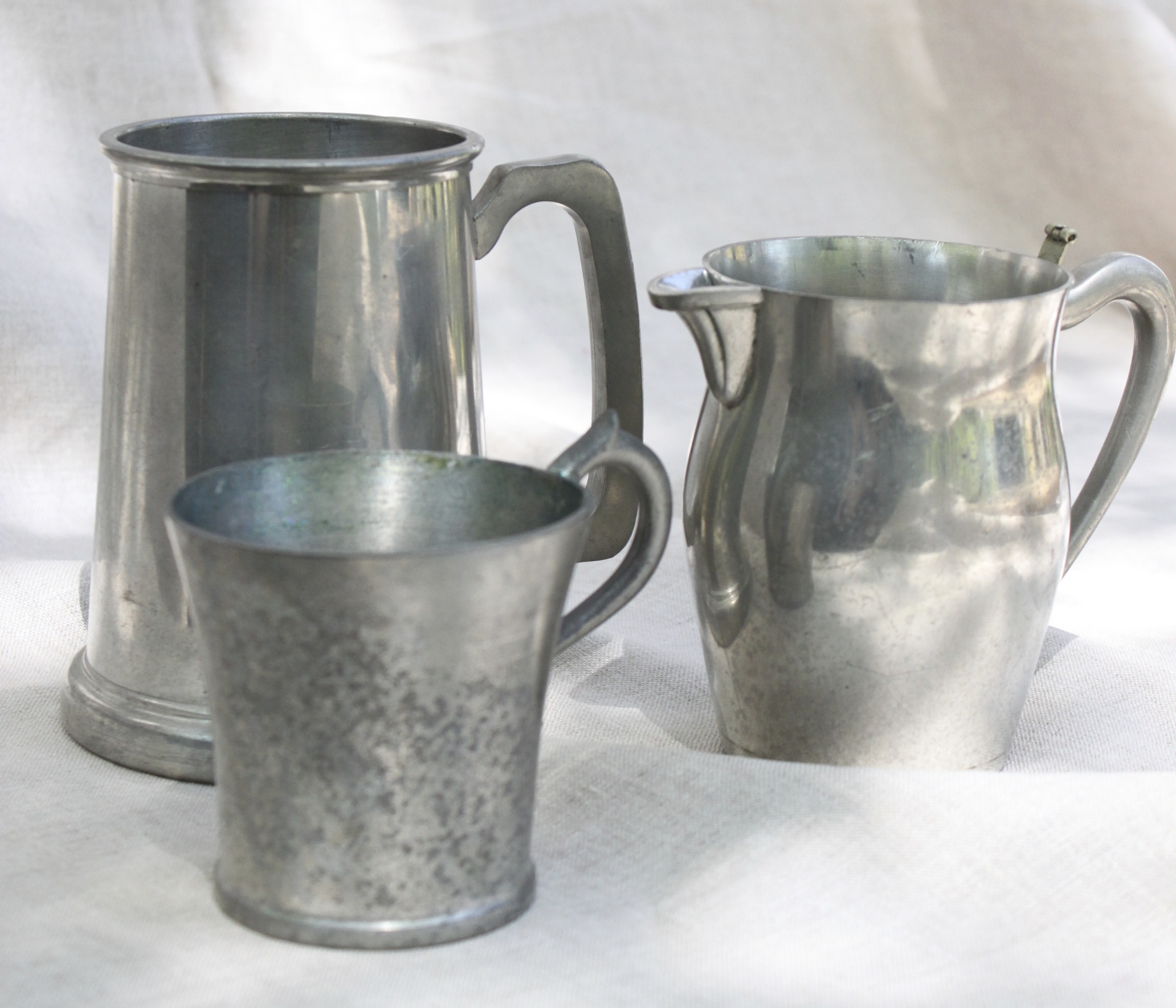 Vintage pewter-assorted sizes and shapes Perfect for floral arrangements $10 each