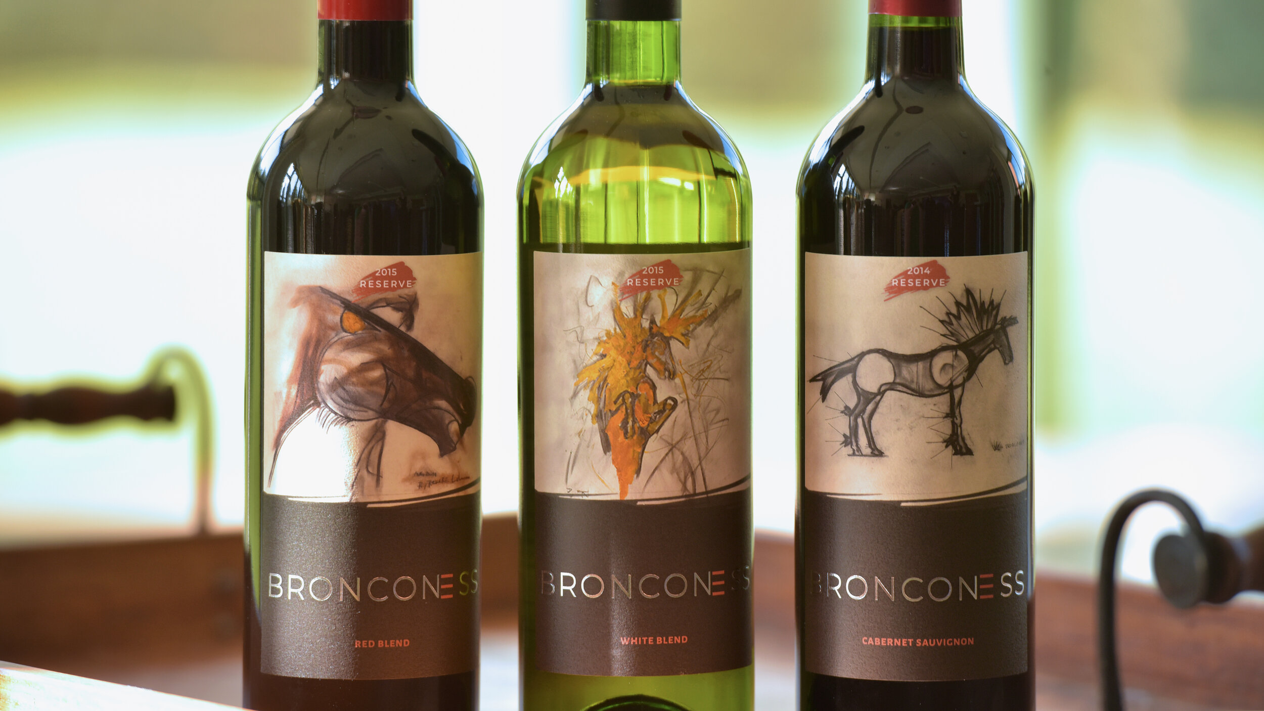  Revere La Noue donated three sketches and the bronco-ness concept for use in the new line of Bronconess Wines.  100% of proceeds go toward student scholarships.   