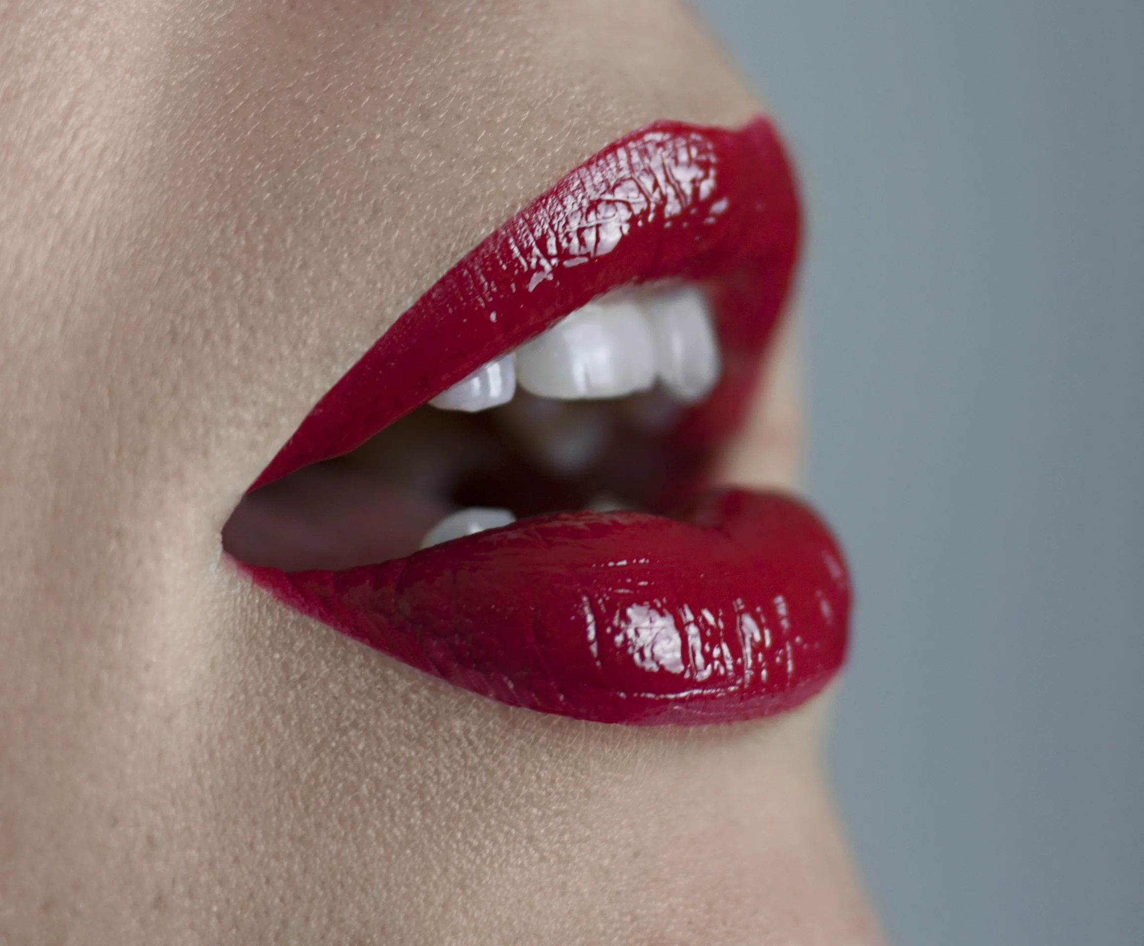 Above a recent red lip I created for my portfolio. and below another red lip from the same shoot, with a brightening filter attached and unedited. Lip Model for this shoot Michelle Pearson. I used CT Red Carpet Red and a clear gloss unbranded for this look.