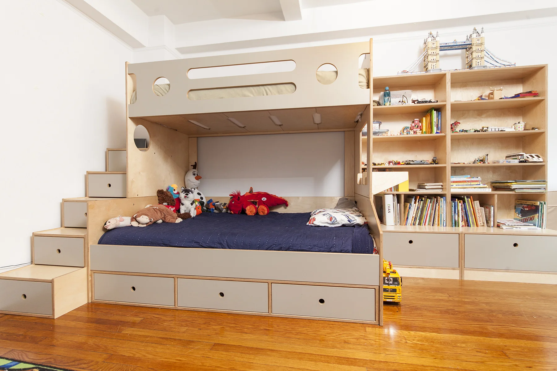 Storage drawers and shelves allow your child to stow toys safely and nearly continuous support beneath our bunk's mattress provides a better night's sleep.