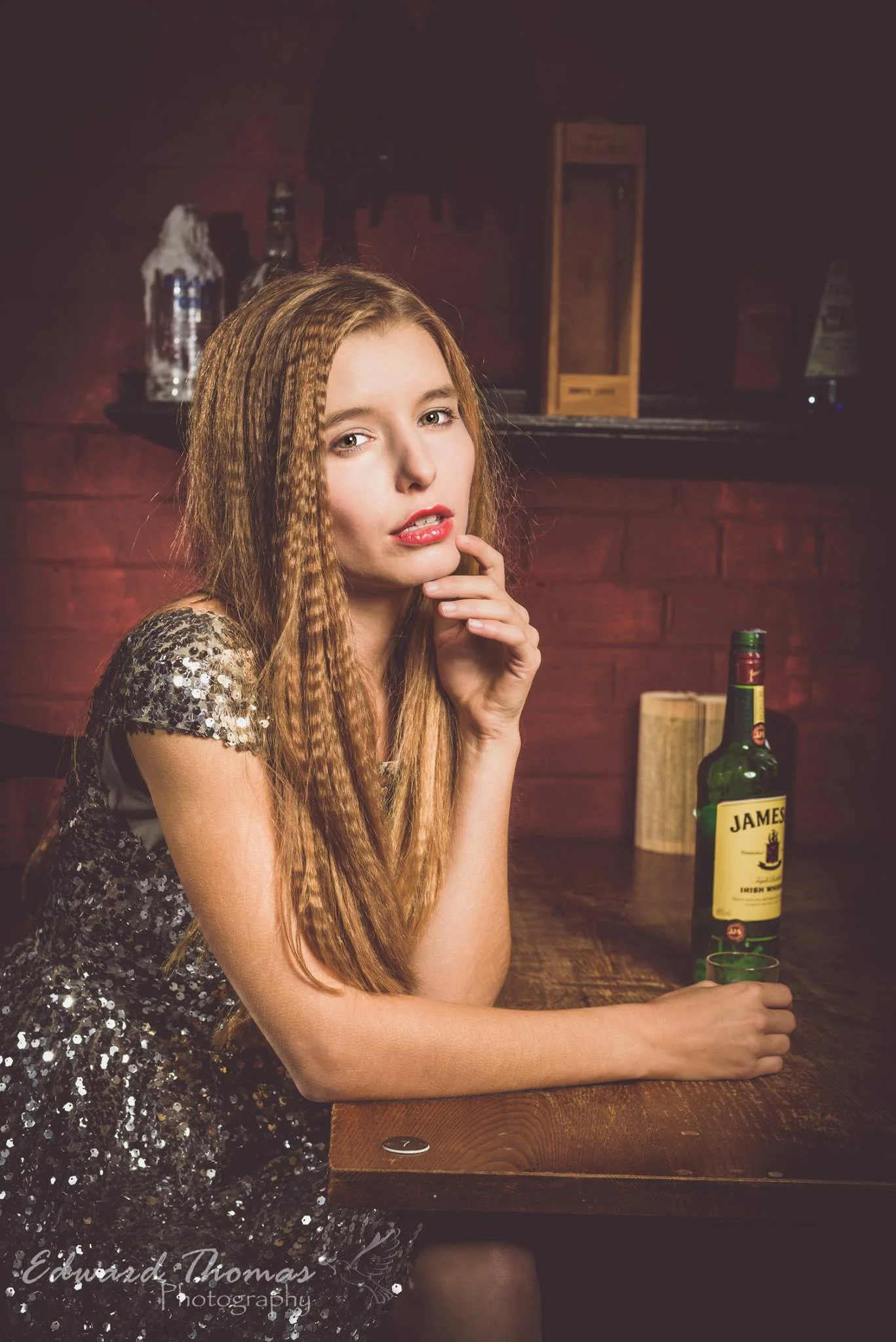 Lovely image by Edward Thomas . 2 lights were used; 1 key, 1 lighting the background and Jade's hair. Flag was used to control hair light and a reflector used to lift the shadows. 
