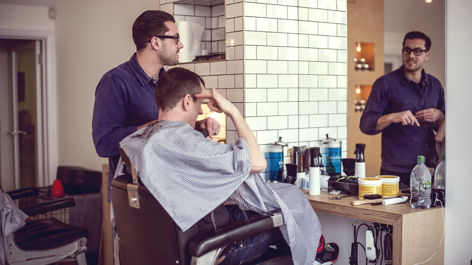 fly-on-the-wall photography reportage style images for your business, like barber and frank in brighton