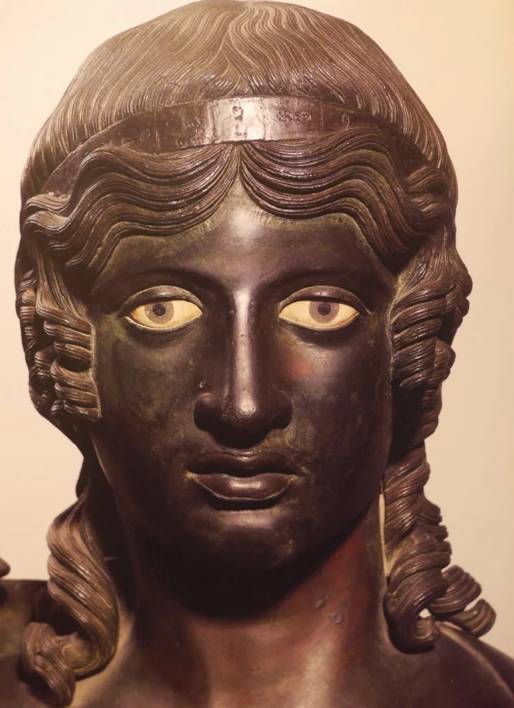This bronze from the Villa of the Papyri at Herculaneum - a setting in my novel The Last Gospel - represents the idealised human form characteristic of Greek-style sculpture used as decorative art in gardens and courtyards.