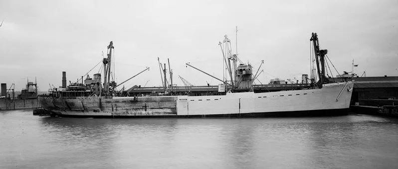 Assault Ship M.V. Empire Elaine on the Clyde in early 1943 being repainted in preparation for Operation Husky, the invasion of Sicily (National Maritime Museum collection).