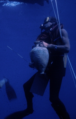 Raising an amphora from a Roman wreck off Sicily. For more on that site see my Archaeology page.