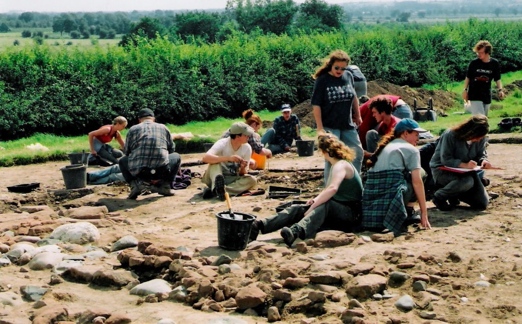 Excavations at Poulton, Cheshire, 1995. For several seasons I was responsible for more than 100 students at this site, part of my job as a Lecturer at the University of Liverpool. The site was a medieval chapel and burial ground associated with a Cistercian monastery, and also contained evidence of Roman and prehistoric occupation. To see the cover of our monograph report click here.