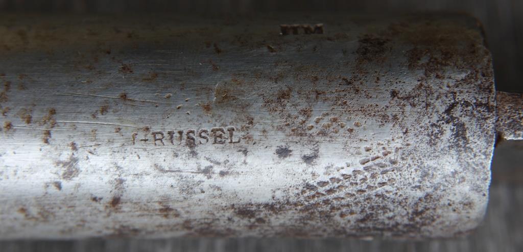 The barrel-maker's name stamped beneath the barrel just forward of the breech.