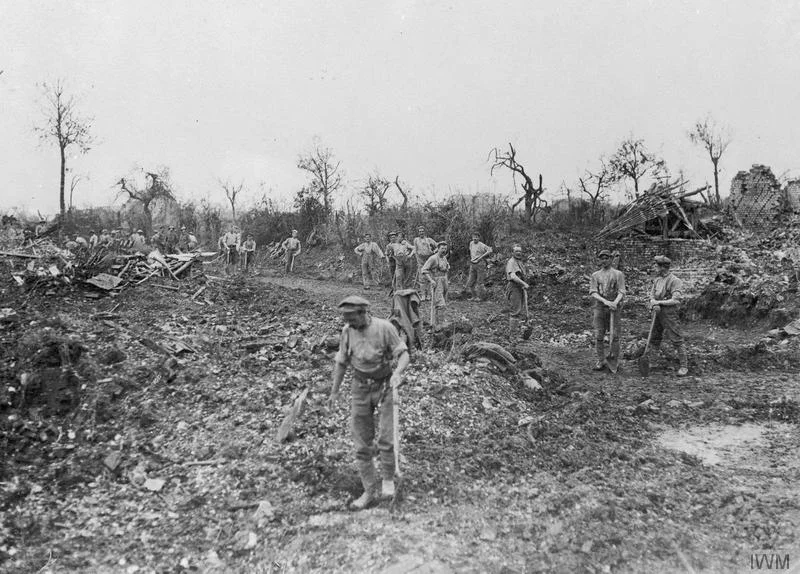 Fricourt, showing British troops clearing away the debris, July 1916 (photo: Royal Engineers No 1 Printing Company, IWM Q 135 ).