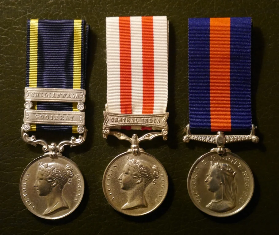 Captain Gordon's campaign medals: the Punjab Medal 1849 (with clasps Chilianwala and Goojerat), the Indian Mutiny Medal (with clasp Central India), and the New Zealand Medal.