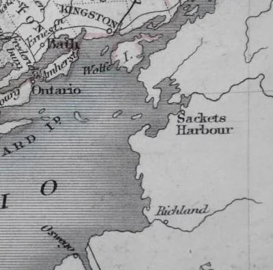 A 19th century map showing the eastern shore of Lake Ontario, with the entrance to the St Lawrence River dividing Upper Canada from New York State at upper right. At the top of the map is the Royal Navy base of Kingston, to the right the US Navy base of Sackets Harbour and at the bottom the US fort of Oswego, site of the British assault on 6 May 1814. The distance across the lake from Kingston to Oswego is about 45 nautical miles.