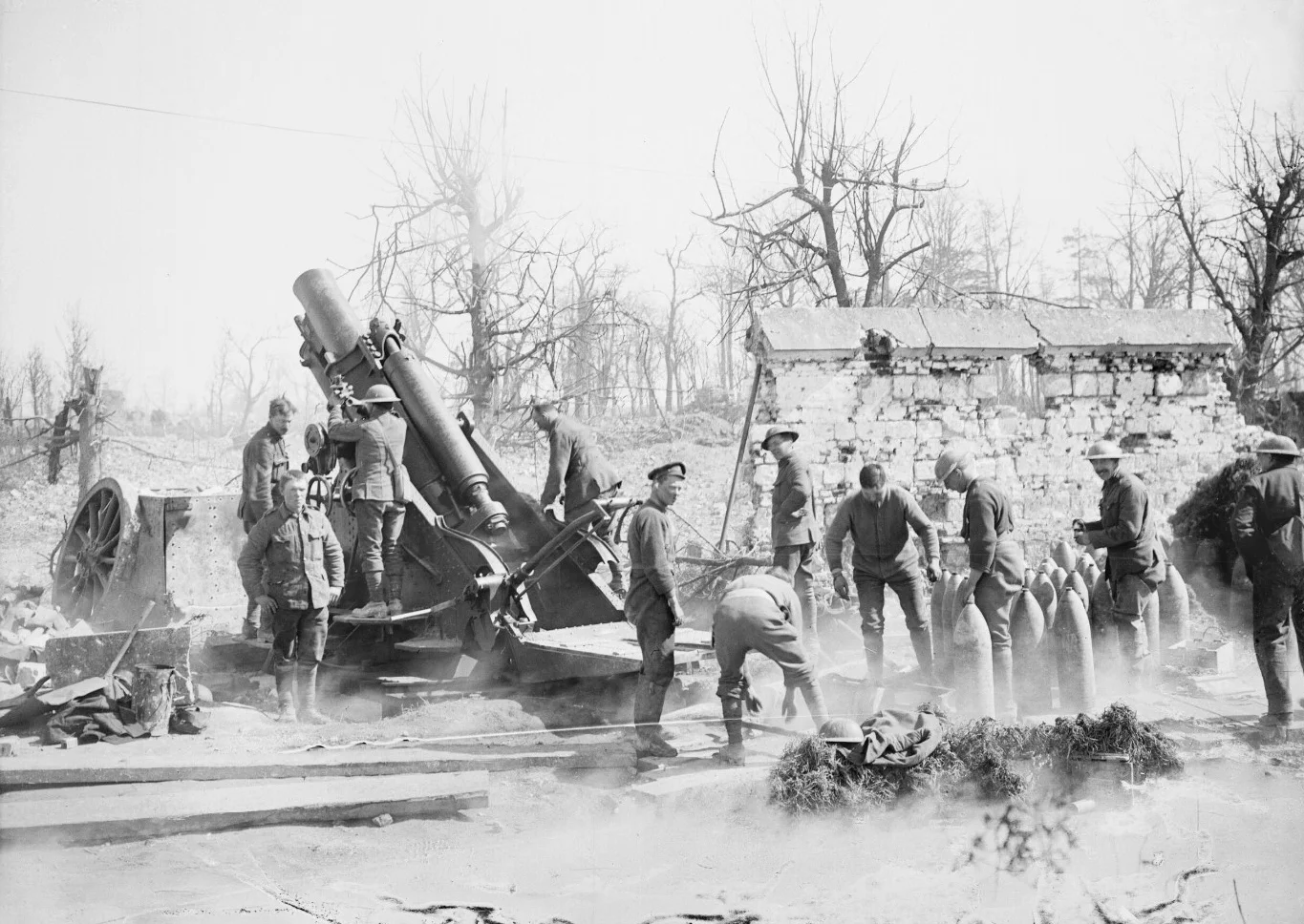 A 9.2 inch howitzer of the Royal Garrison Artillery in action in the ruins of Tilloy-les-Mofflaines, near Arras, April 1917 (photo: Lieutenant John Warwick Brooke, © IWM (Q 5221)). These photos of 9.2 inch howitzers and the film show the large box filled with earth on the same platform in front of the howitzer that was used to counterbalance the recoil; this was one reason why the 9.2s were so accurate. In harsh winter conditions they were sometimes filled up with water instead, and if the Battery had to move quickly they were often left behind or blown up as they would take too long to empty.