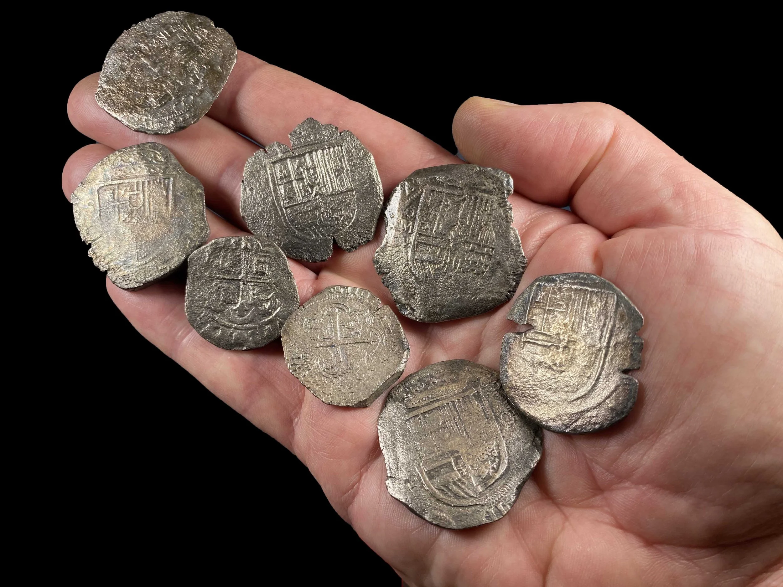 Rill coins in hand best compressed.jpg