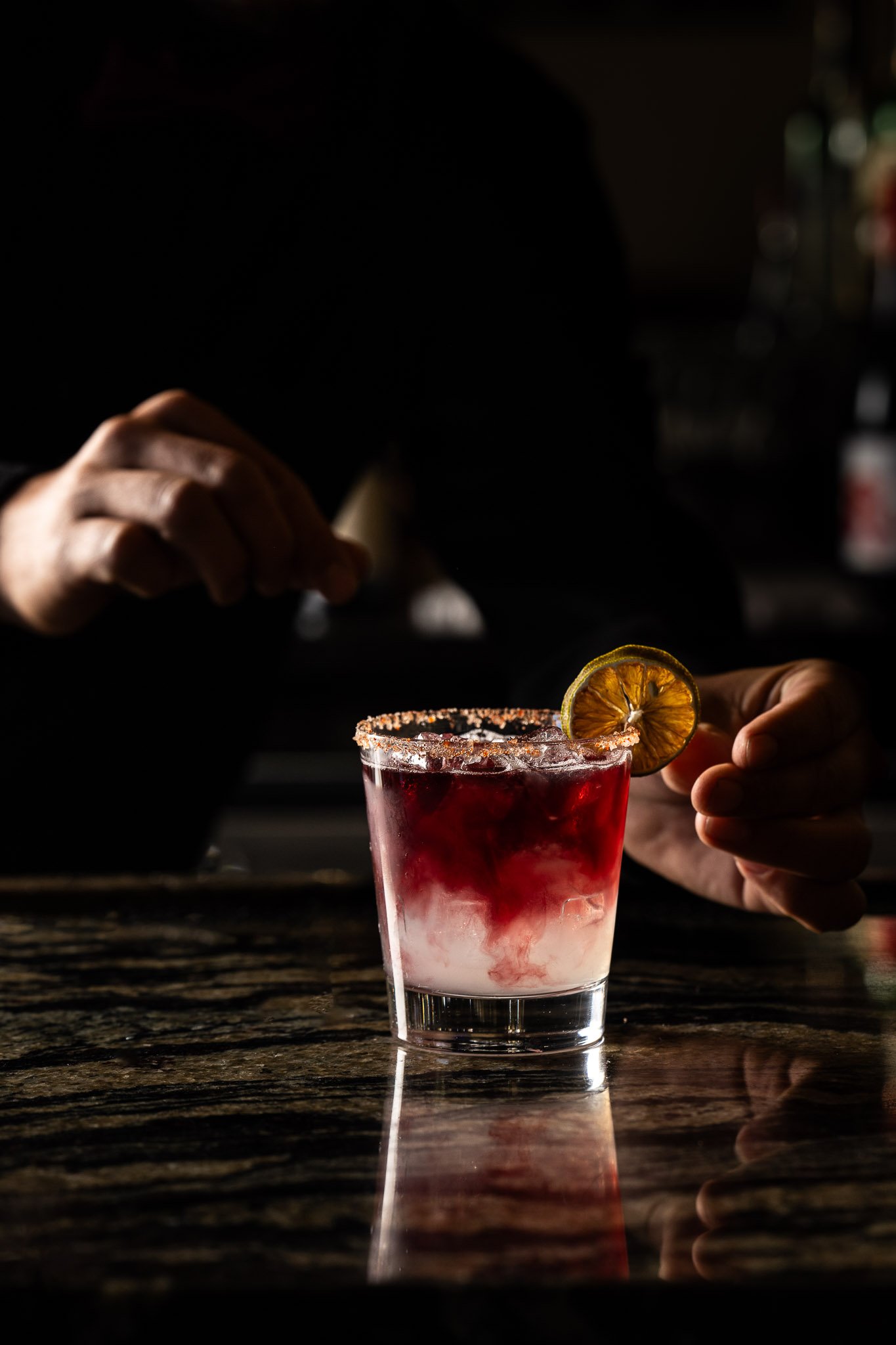  A bartender prepares a Sangria Sunset 