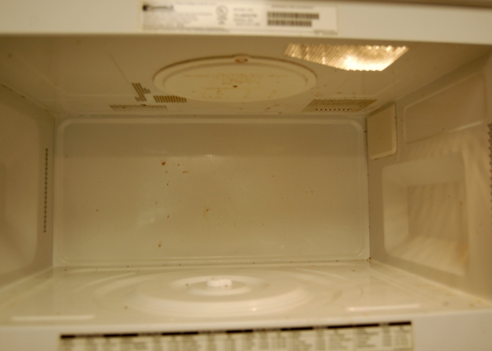 After Microwaving the water and vinegar mix and wiping with a dry rag.