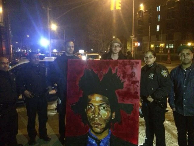 The moment after the chase had ended and the Basquait painting was retrieved.