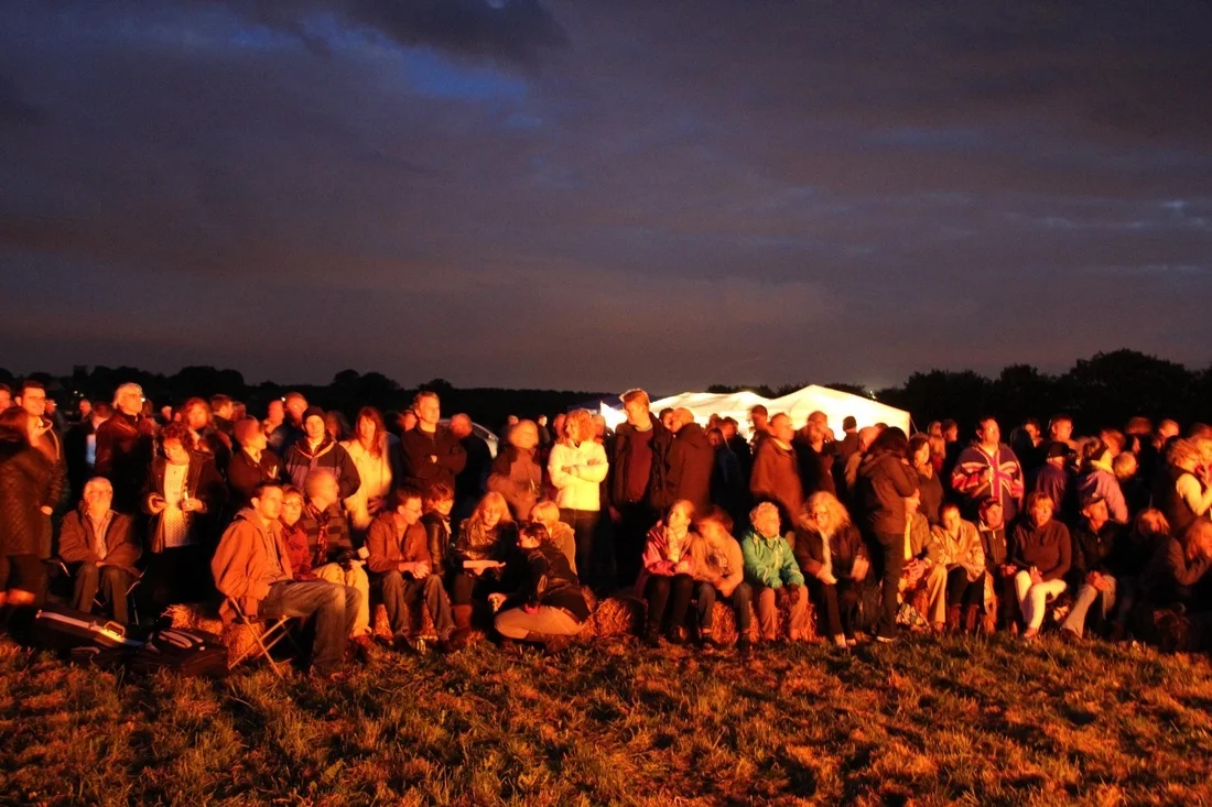Queen's Jubilee - Residents keep warm by the Beacon
