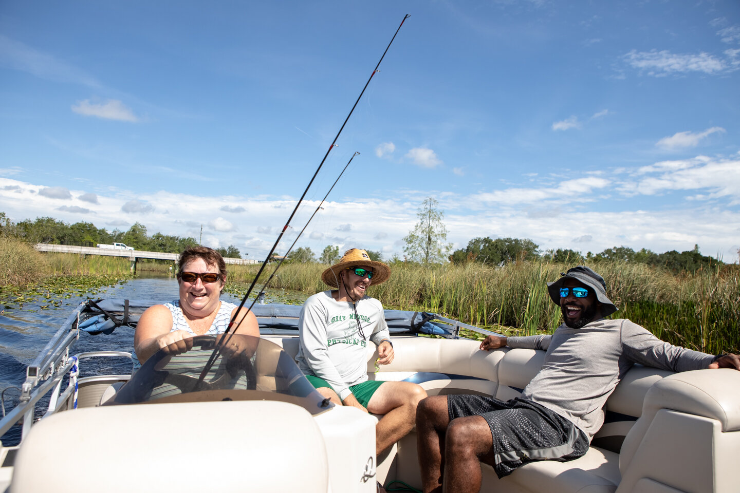 lifestyle-photographer-orlando-dynamite-studio-inc-corporate-groveland-fishing-group-people-happy-sunshine-outside-fisherman-boat.jpg