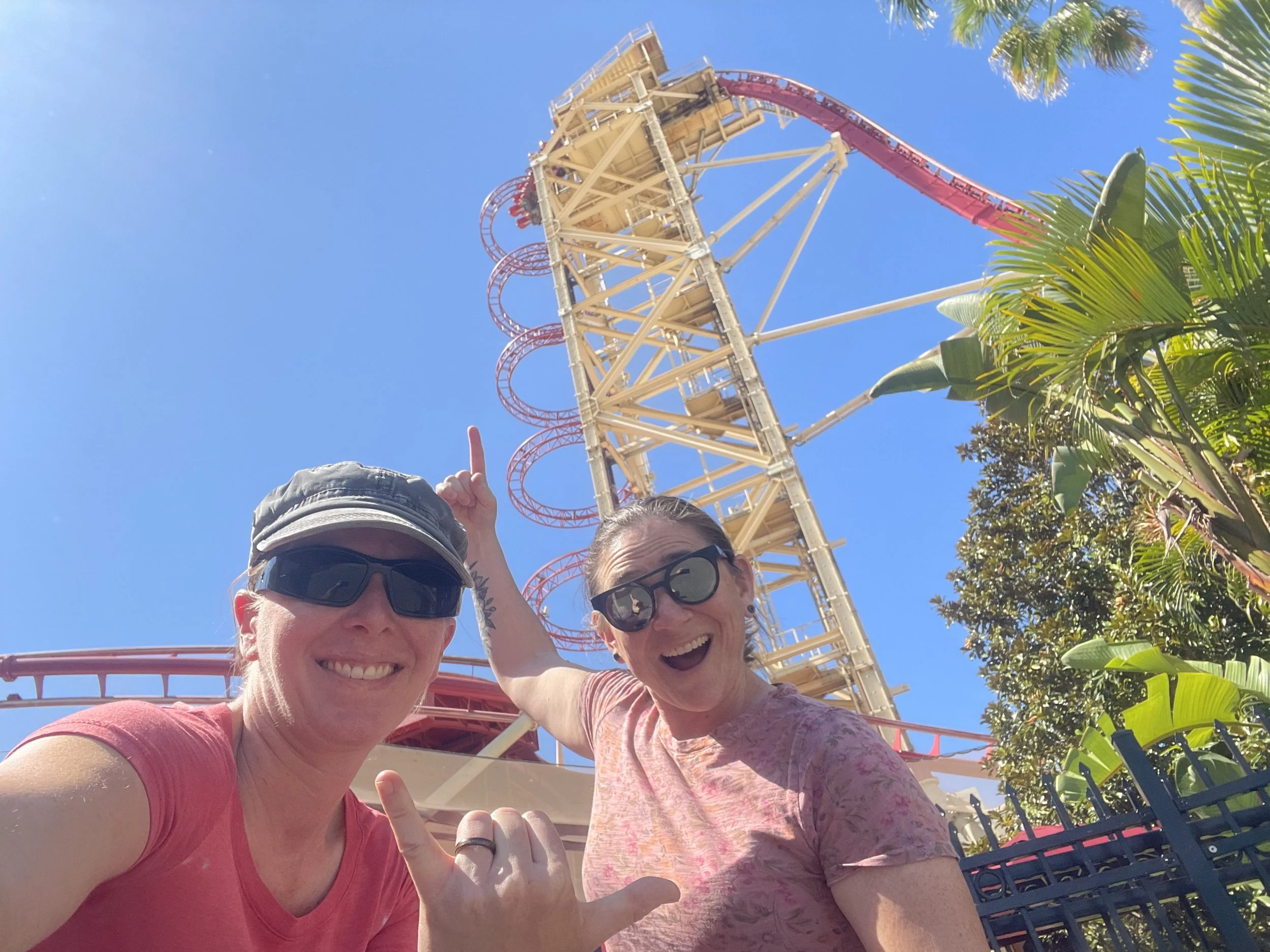 kellie and lindsay ready to go on a rollercoaster