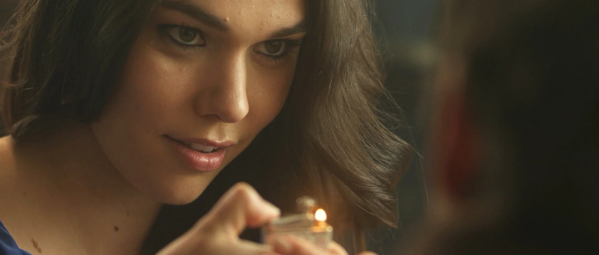Kelly holding lighter.jpg