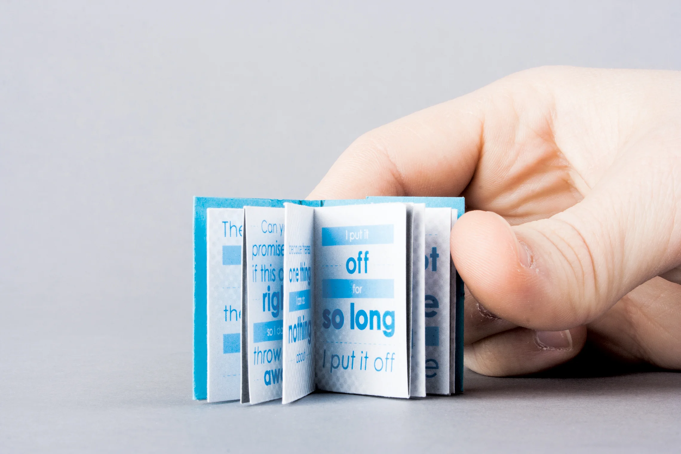 Book with hand NEW.jpg