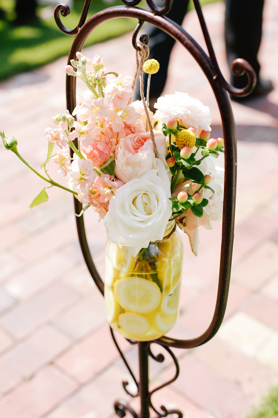  pretty wedding aisle marker flowers with lemons&nbsp;| photo by &nbsp;www.annabellacharles.com 