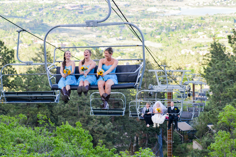 Chairlift ride to the wedding | Cheyenne Mountain Zoo wedding | photo by Trystan Photography