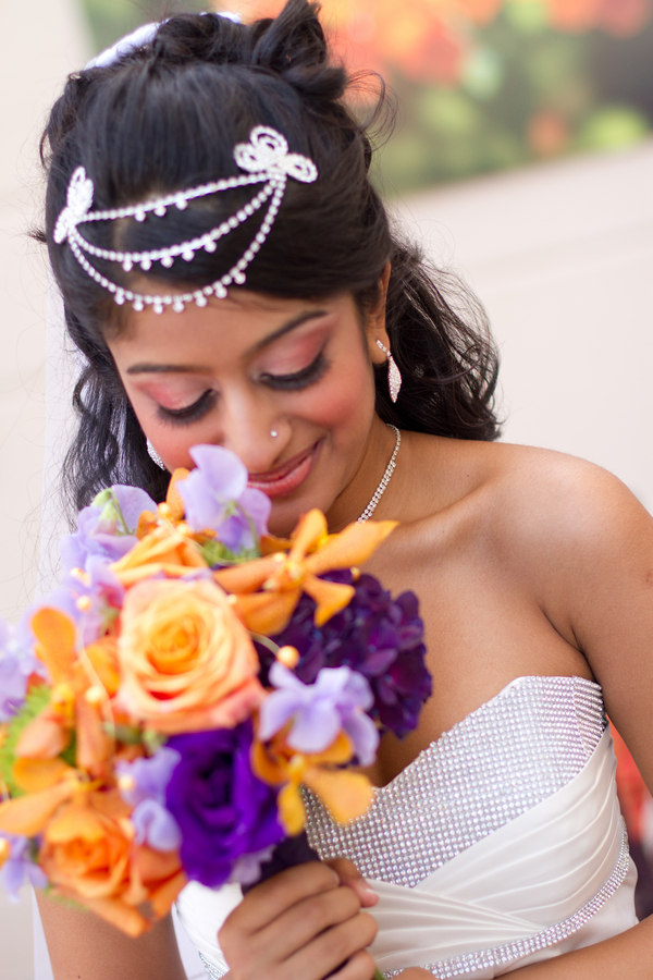 a bride and her purple and orange wedding bouquet from an Indian Fusion styled shoot | photo by Dreamcicle Studios