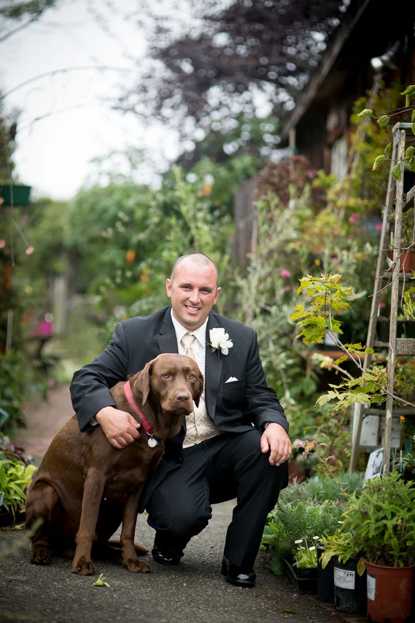 A groom and a dog | photo by Portrait Design by Shanti