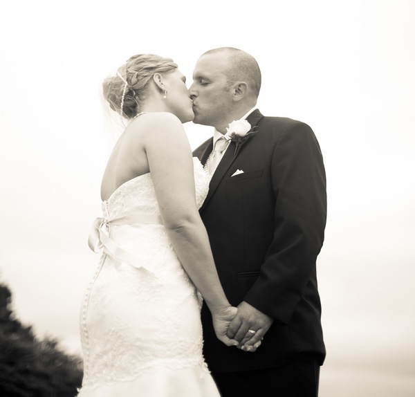  Beautiful black and white photo of the bride and groom kissing | photo by Portrait Design by Shanti 