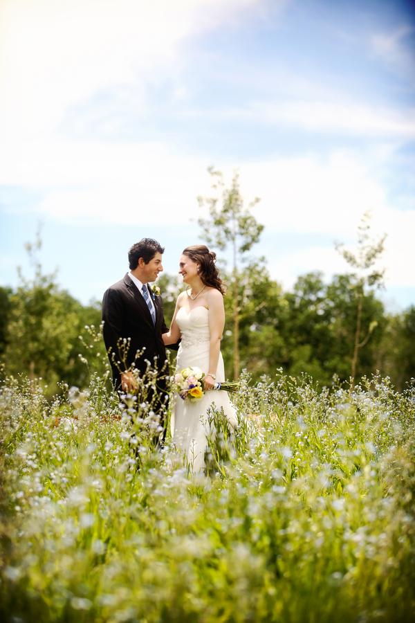 bride and groom portraits in a wildflower field from a Utah wedding | photo by Pepper Nix Photography