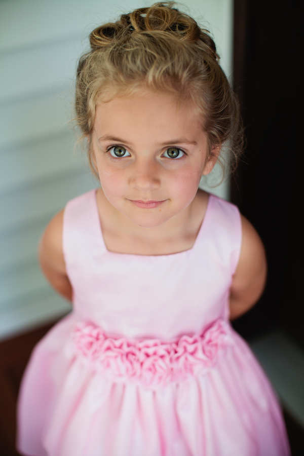  beautiful flower girl in a pretty pink dress | photo by Mary Dougherty Photography 