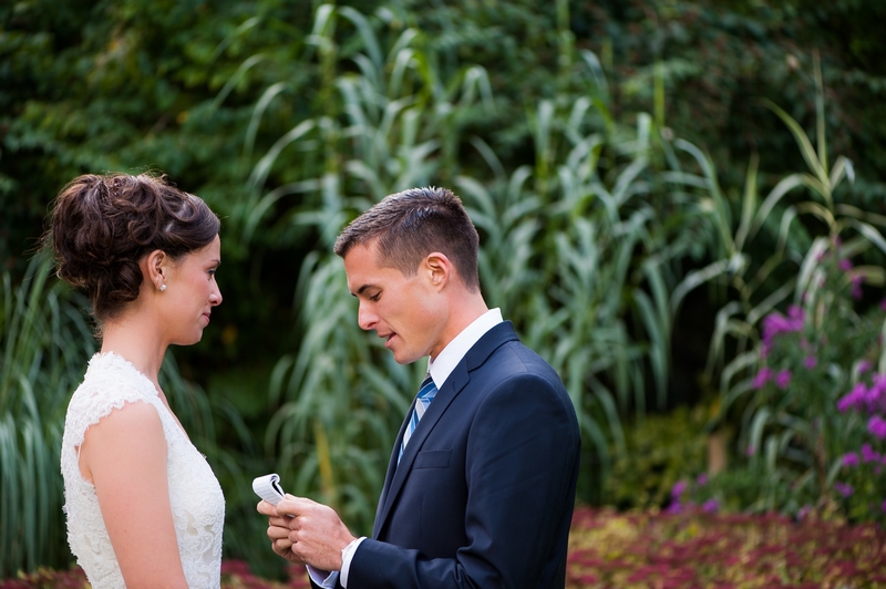  Groom reading vows to Bride in&nbsp;Parc Montsouris for their elopement to Paris, France | planned by Paris Weddings by Toni G. | photography by The Paris Photographer 