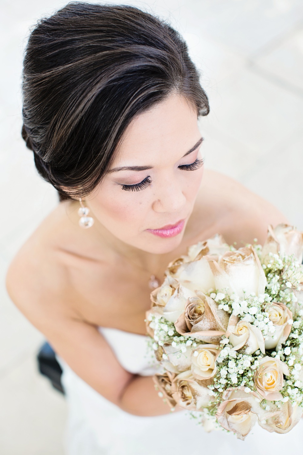 A Long Stem White Rose Bouquet Hand Dipped In Gold