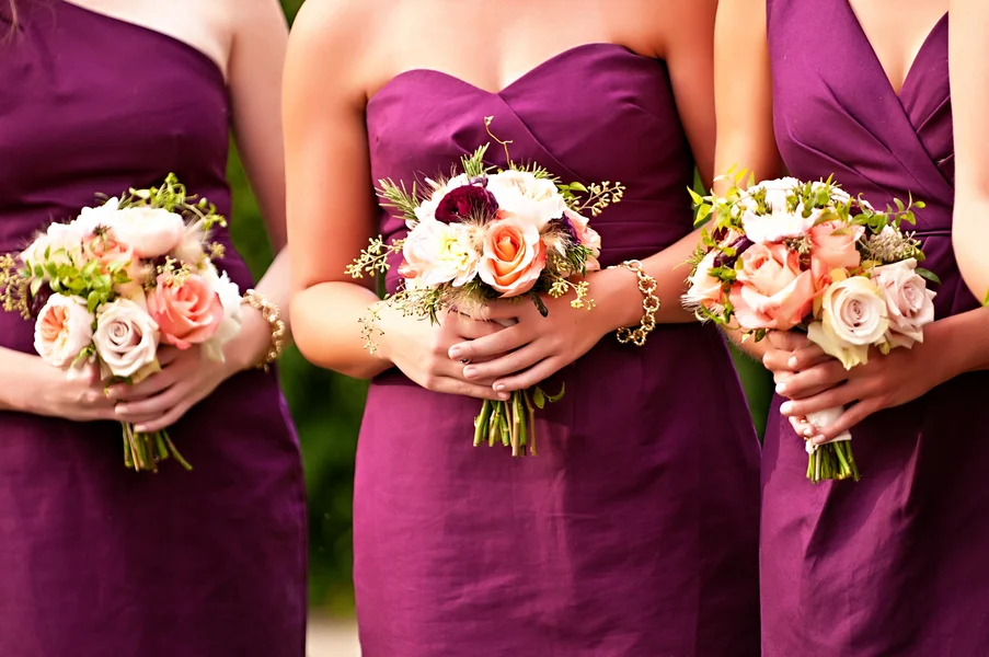 Pretty mini bouquets for the bridesmaids in plum dresses | photo by wwww.EverAfterVisuals.com as seen on www.brendasweddingblog.com