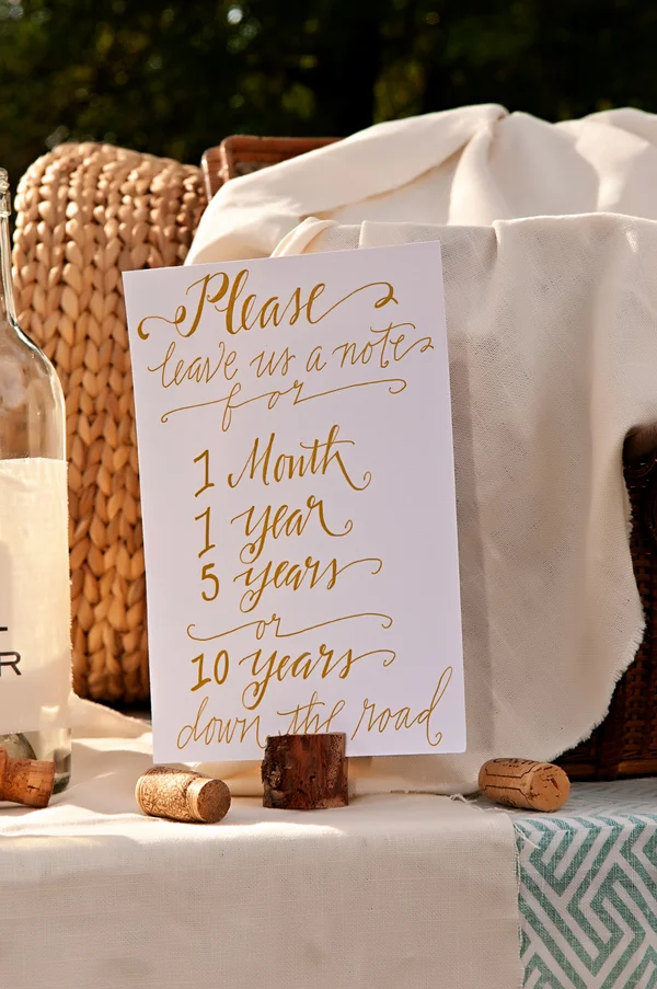 Cute wedding guest book idea - guests leave notes for 1 month, 1 year, 5 years or 10 years | photo by wwww.EverAfterVisuals.com as seen on www.brendasweddingblog.com