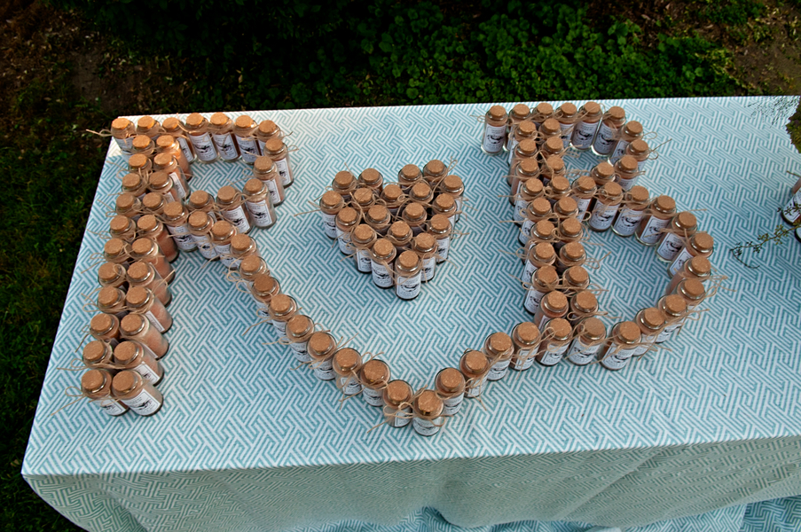  Couples initials created with the favor jars | photo by wwww.EverAfterVisuals.com as seen on www.brendasweddingblog.com 