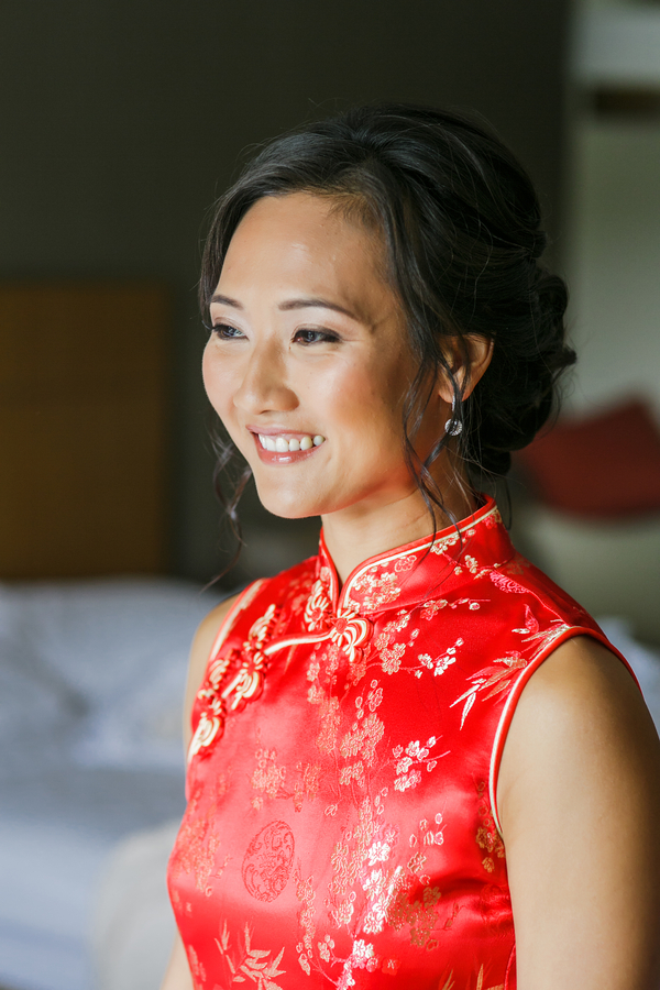  Bride in her red dress for a traditional Chinese Wedding Tea Ceremony | photo by Nicole Chan Photography 