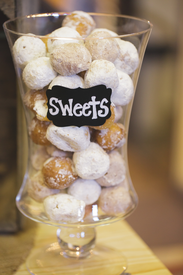  Donut Holes Displayed in a Glass Vase with Chalkboard Sign | as seen on BrendasWeddingBlog.com 