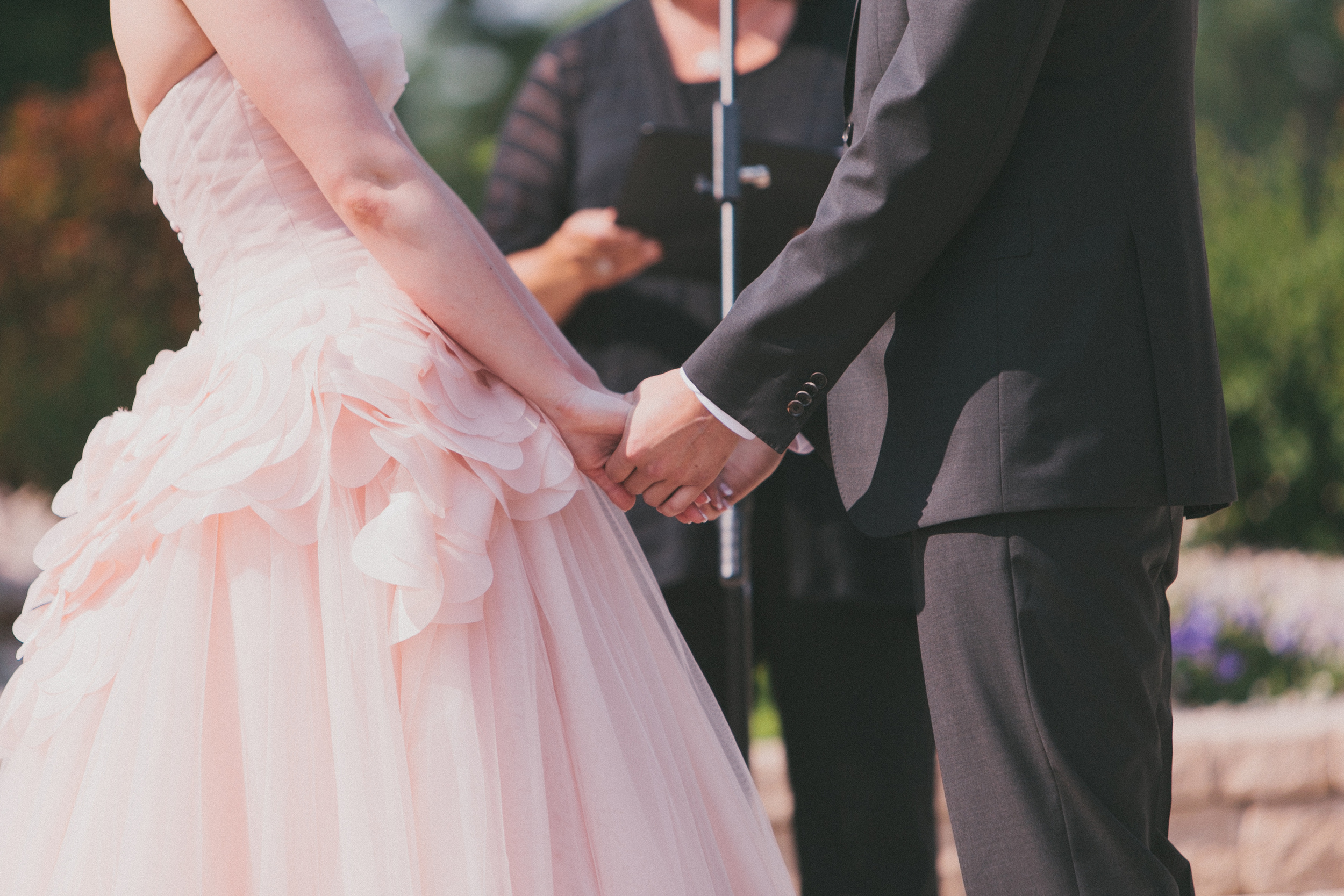  Bride in her Pink Vera Wang Wedding Gown saying her vows | photo by blf Studios | wedding by Madeline's Weddings 