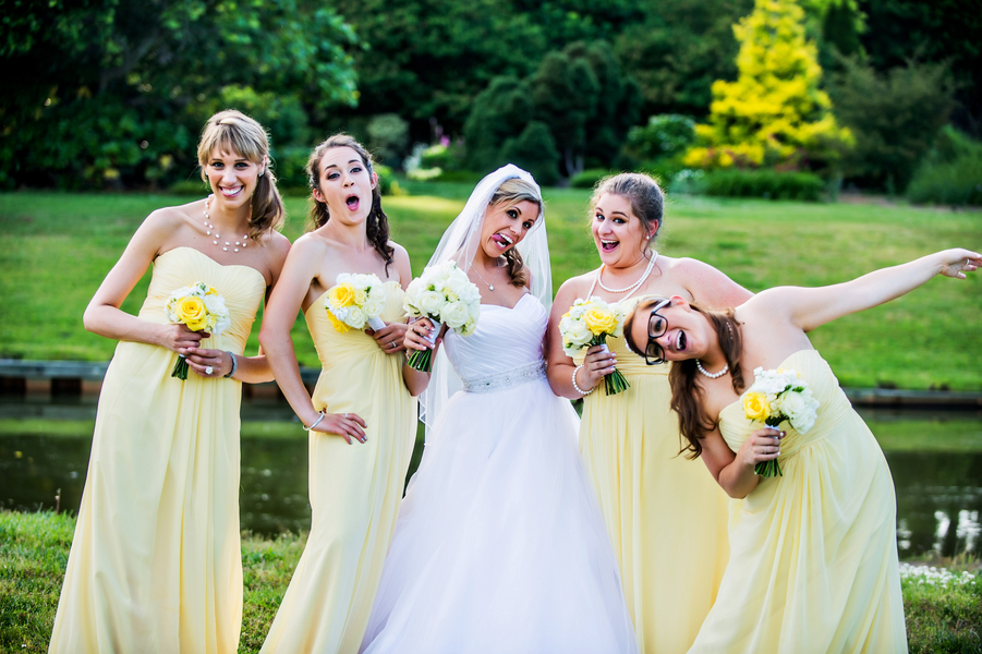  Fun Photo of Bride with her Bridesmaids | photo by Ross Costanza Photography | as seen on www.BrendasWeddingBlog.com 