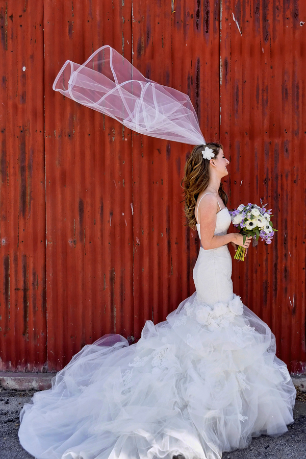  Loving this Bride's Wedding Dress with Tulle Layers | Photo by William Innes Photography | via www.brendasweddingblog.com 