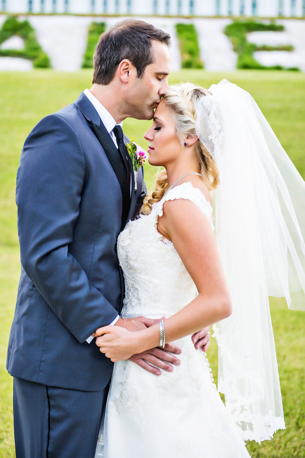  Bride and Groom Celebrating Their Love | photo by Ross Costanza Photography | as seen on www.brendasweddingblog.com 