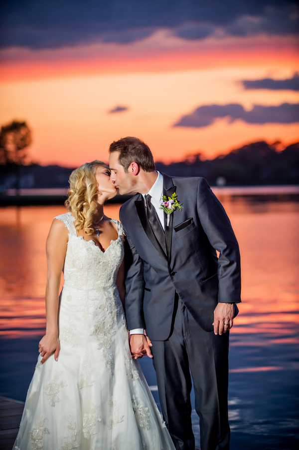  Sunset Portrait of the Bride and Groom Kissing | photo by Ross Costanza Photography | as seen on www.brendasweddingblog.com 