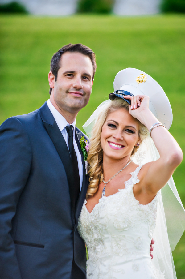  Bride Tipping the Hat | photo by Ross Costanza Photography | as seen on www.brendasweddingblog.com 