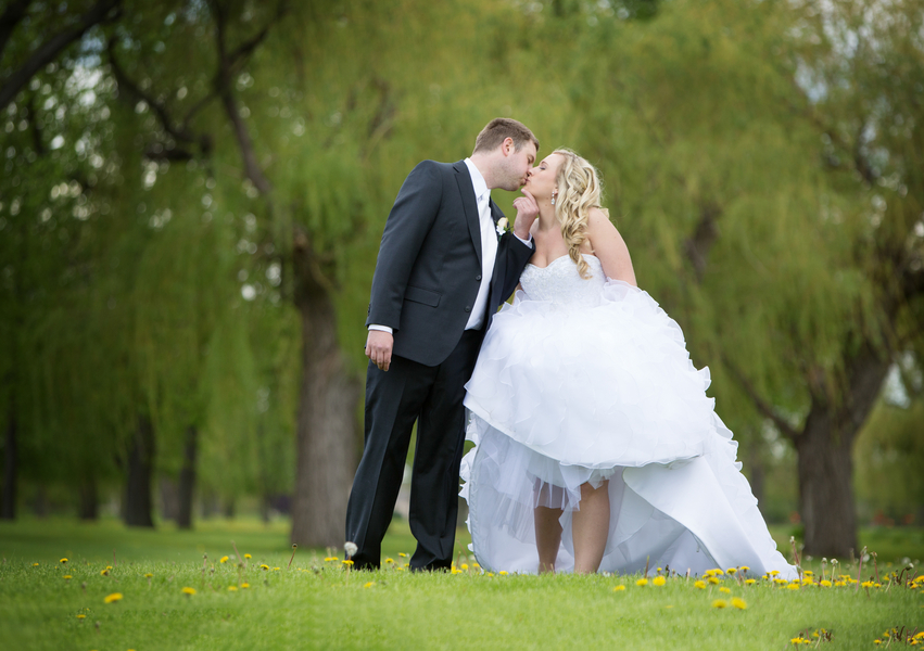  Intimate Bride and Groom Kiss on the Golf Course | photo by Real Image Photography | as seen on www.brendasweddingblog.com 