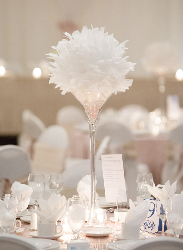  Feathers in Tall Glass Vase for Wedding Centerpiece | photo by Real Image Photography | as seen on www.brendasweddingblog.com 