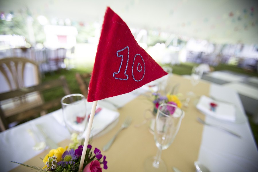  Cute Felt Pendant Table Number Signs from a DIY Backyard Wedding | photo by Two Sticks Studios | as seen on www.brendasweddingblog.com 