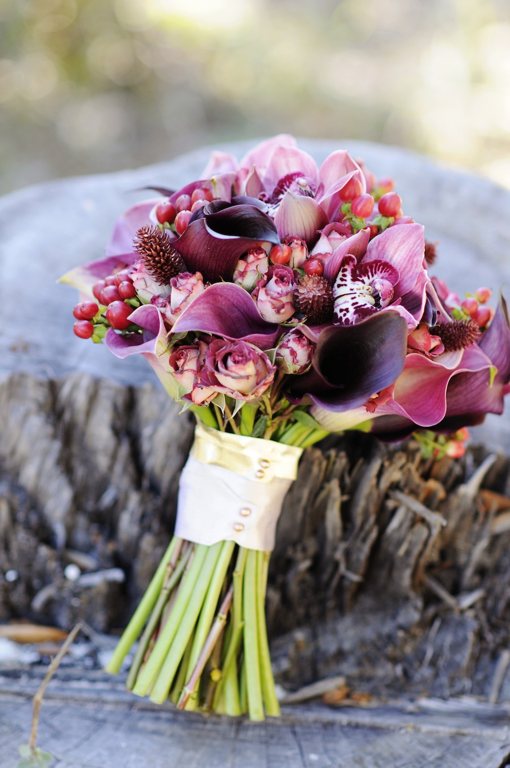  Stunning Red and Plum Wedding Bouquet / from a Winter Wedding Inspired Photo Shoot / photo by Kismis Ink Photography / Bouquet by MMD Events / as seen on www.BrendasWeddingBlog.com 