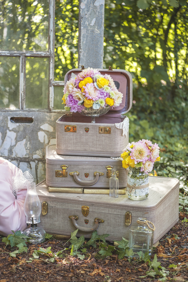  Vintage books and suitcases are the perfect prop for this Rustic Garden Inspired Wedding / styled by&nbsp;D'Love Affair Weddings &amp; Events / photo by L'Estelle Photography / as seen on www.BrendasWeddingBlog.com 